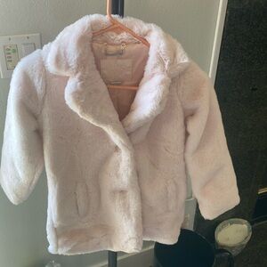 Light pink small furry jacket jacket gently used with extra button